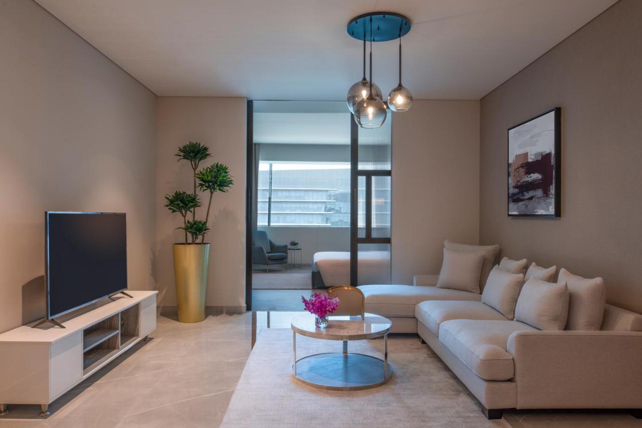 Steigenberger Residence Ad Dawhah Esterno foto A living room in a typical apartment