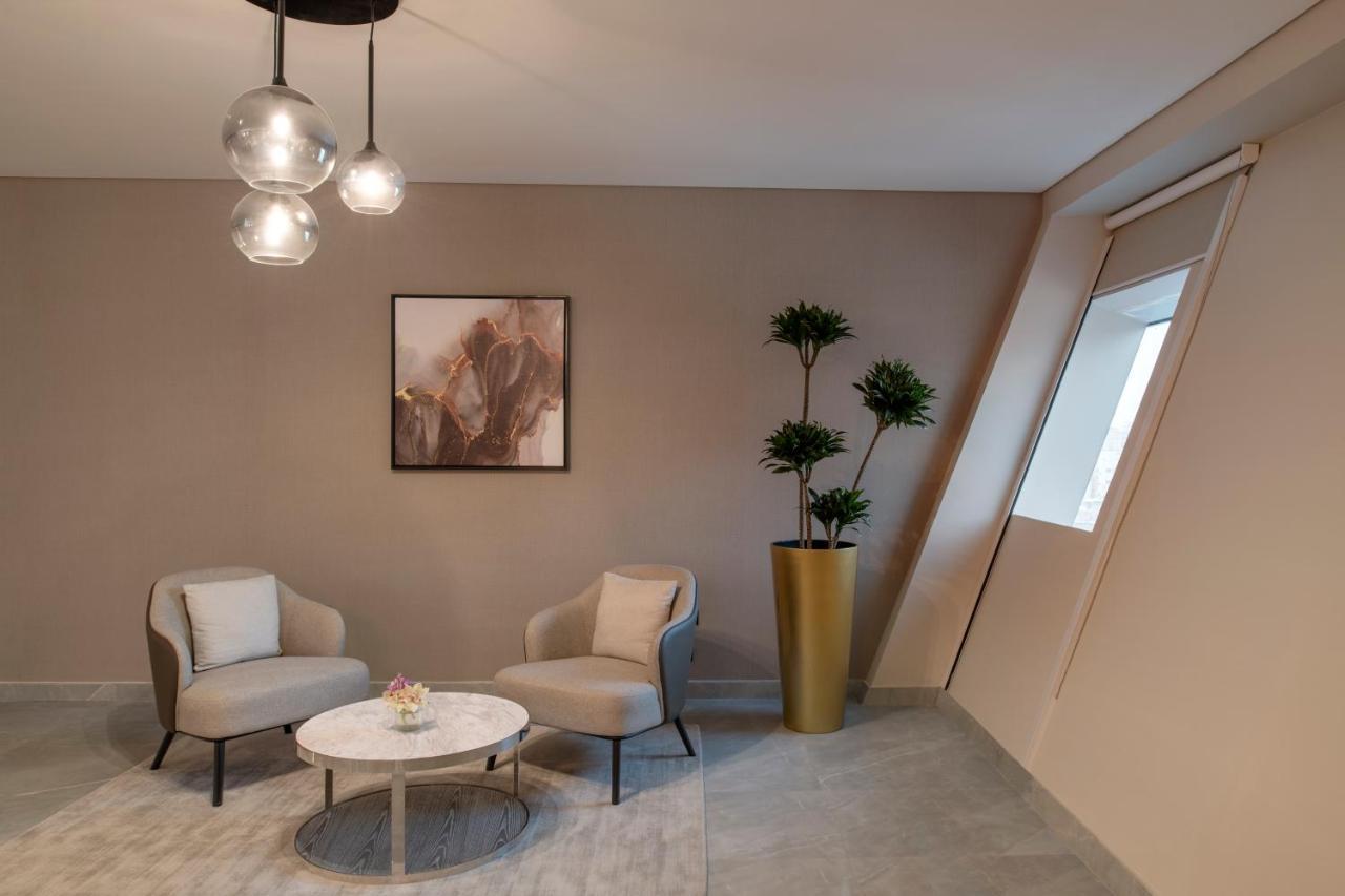 Steigenberger Residence Ad Dawhah Esterno foto A staged living room